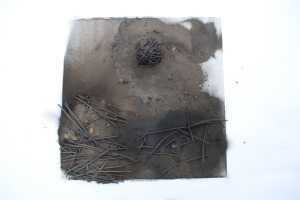 Sequel II Revisited Charcoal, Charcoal dust and sand. Floor Based work 60 x 60 cms 